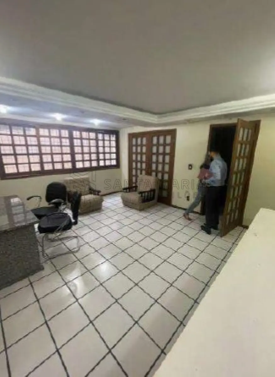 LOTE 002 - Sala Comercial nº 01, no Edifício Tívoli em Santa Maria/RS, com uma área privativa de 138,040 m² e o Box Garagem nº 08, localizado no segundo subsolo ou primeiro pavimento do Edifício Tívoli, ambos situados  à Rua Floriano Peixoto, nº 611 em Santa Maria/RS. Matriculados sob nº 85.105 e 85.098 do CRI de Santa Maria/RS.