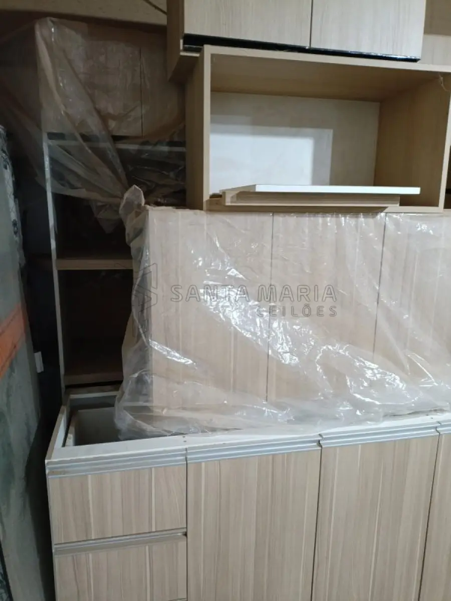 LOTE 002 - Móveis planejados de cozinha novos, aos quais encontram-se desmontados, 100% (cem por cento) MDF 18mm, corpo em MDF branco e externo em amadeirado, medidas conforme projeto em anexo e na foto.