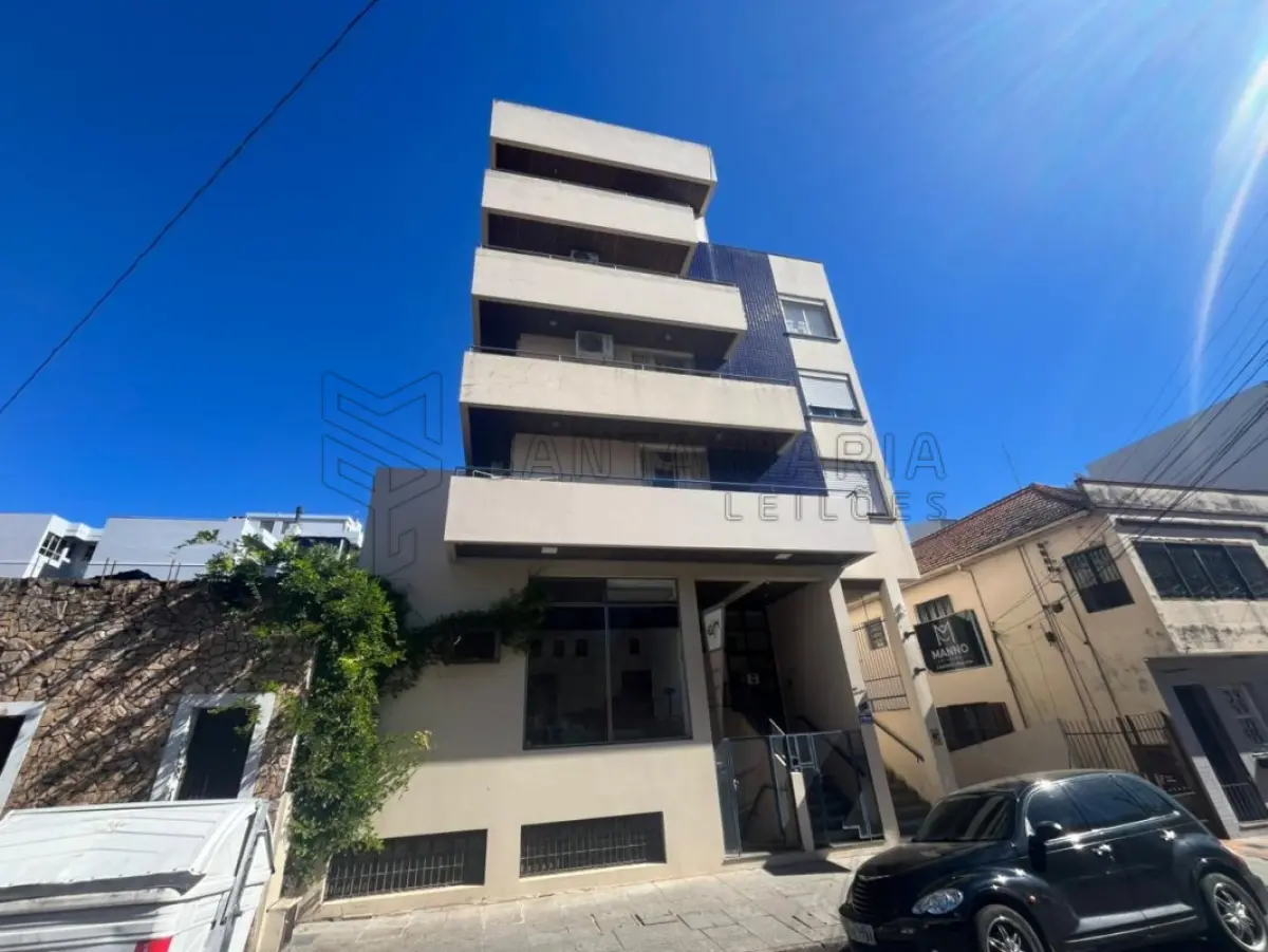 LOTE 002 - Sala Comercial nº 01, no Edifício Tívoli em Santa Maria/RS, com uma área privativa de 138,040 m² e o Box Garagem nº 08, localizado no segundo subsolo ou primeiro pavimento do Edifício Tívoli, ambos situados  à Rua Floriano Peixoto, nº 611 em Santa Maria/RS. Matriculados sob nº 85.105 e 85.098 do CRI de Santa Maria/RS.