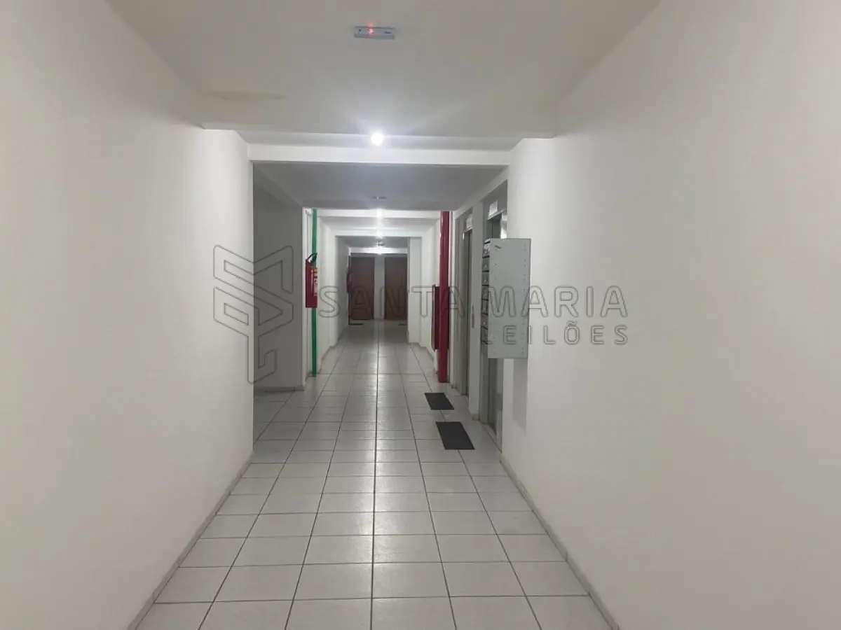 LOTE 002 - Apartamento 107 do edifício Residencial Villes De France situado à Avenida Prudente de Morais, nº 394, bairro Petrópolis em Natal/RN, e o box garagem 97, com área real privativa de 68,015, área real comum de 29,963 e área real total de 97,978, fração ideal de 0,007328 do imóvel n° 25.621 do CRI de Natal/RS.