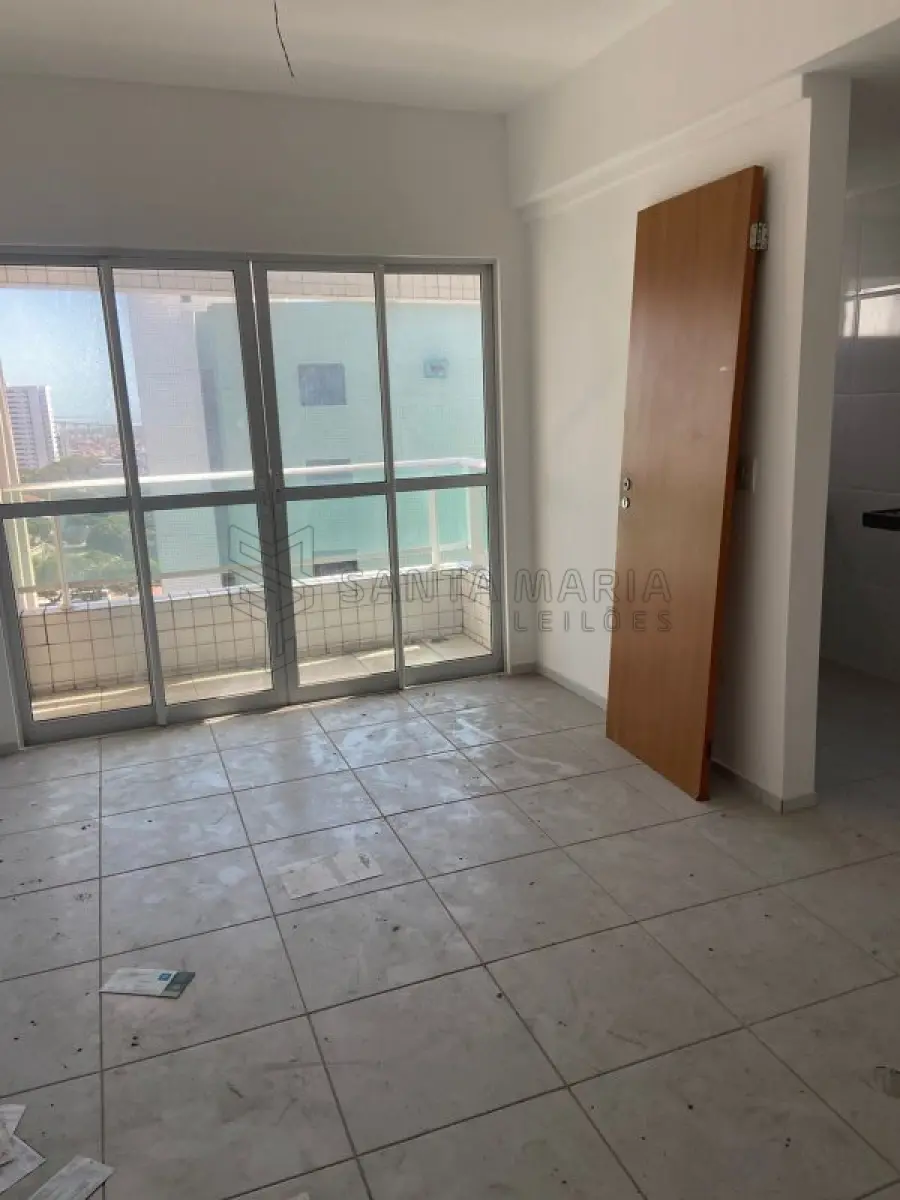LOTE 008 - Apartamento 1404 do edifício Residencial Villes De France situado à Avenida Prudente de Morais, nº 394, bairro Petrópolis em Natal/RN, e o box garagem 49, com área real privativa de 69,672, área real comum de 30,372 e área real total de 100,045 fração ideal de 0,007428 do imóvel n°25.621 do CRI de Natal/RS.
