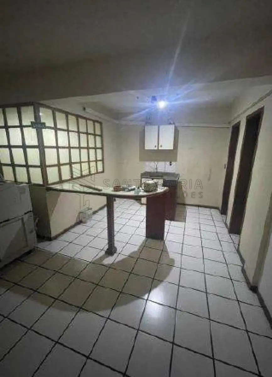 LOTE 002 - Sala Comercial nº 01, no Edifício Tívoli em Santa Maria/RS, com uma área privativa de 138,040 m² e o Box Garagem nº 08, localizado no segundo subsolo ou primeiro pavimento do Edifício Tívoli, ambos situados  à Rua Floriano Peixoto, nº 611 em Santa Maria/RS. Matriculados sob nº 85.105 e 85.098 do CRI de Santa Maria/RS.