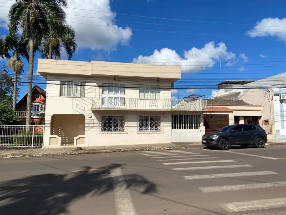 LOTE 001 - Fração de 14,28571429% pertence a Vitor Angelo Minuzzi e Jeane Drews Minuzzi do imóvel localizado na Rua Tito Beccon, 212, bairro Vila Nova em Santiago/RS com a área construída averbada de 279,94m² e o respectivo terreno com 1.187,80m², no quarteirão formado pelas ruas Tito Beccon, Ciro Melo, Rogerio Francisco da Rosa e José Caetano de Melo. Matriculado sob n° 48.236 do CRI de Santiago/RS. Coproprietário: Vera Mariza Kubica Minuzzi; Marlene Campos Minuzzi; Angela Maria Minuzzi; Jane Clea Minuzzi; Claudete Minuzzi Dorneles; Vivian Kubica Minuzzi do Prado; Eduardo Kubica Minuzzi.