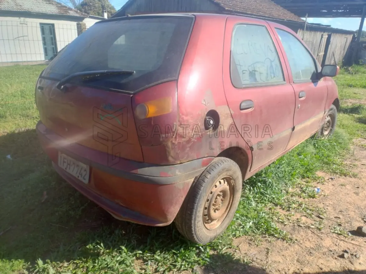 LOTE 001 - Veículo FIAT/PALIO EDX, ano/modelo 1996/1996, placas IFH7742, RENAVAM 659894483, na cor vermelha, com diversas partes da lataria apodrecidas, aparentando estar sem rodar há muito tempo. Localização do bem: Deposito da Exequente em Itaara/RS.