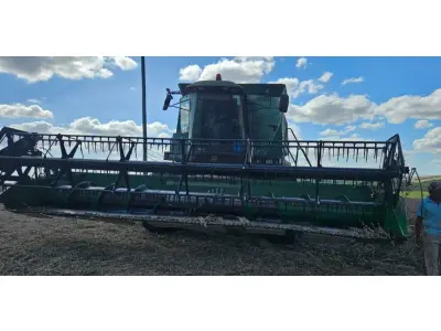 LOTE 001 - Uma colheitadeira John Deere usada, modelo 1550, ano/modelo 2003, chassi CQ1550A047177. E, uma plataforma de corte John Deere usada, modelo 0323, ano/modelo 2003, chassi CQ0323A034895.