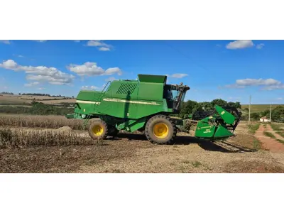 LOTE 001 - Uma colheitadeira John Deere usada, modelo 1550, ano/modelo 2003, chassi CQ1550A047177. E, uma plataforma de corte John Deere usada, modelo 0323, ano/modelo 2003, chassi CQ0323A034895.