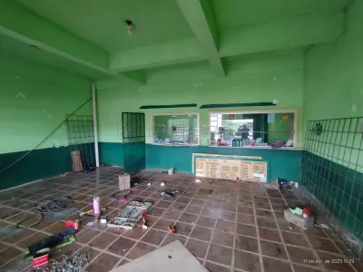 LOTE 001 - Terreno urbano com 987,19m², contendo um prédio de alvenaria com área de 158,50m e uma  área coberta, medindo 233,08m², perfazendo uma área total construída de 391,58m², localizado na Rua  Prudente Domingues esquina com a Rua Manoel Ribas em Cacequi/RS. Matriculado sob n°6.723 do CRI de Cacequi/RS.