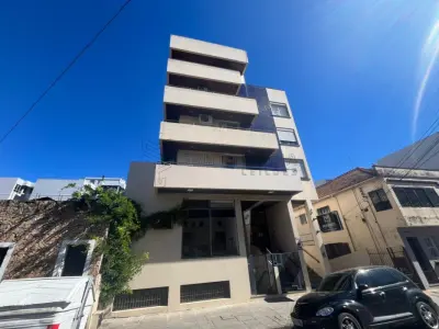 Sala Comercial nº 01, no Edifício Tívoli em Santa Maria/RS, com uma área privativa de 138,040 m² e o Box Garagem nº 08, localizado no segundo subsolo ou primeiro pavimento do Edifício Tívoli, ambos situados  à Rua Floriano Peixoto, nº 611 em Santa Maria/RS. Matriculados sob nº 85.105 e 85.098 do CRI de Santa Maria/RS.
