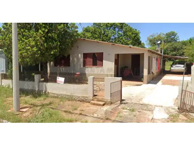 Lote 001 - um terreno com a área aproximada de 700m², localizado na rua princesa isabel, nº 1132 no bairro vila rica em santiago/rs, onde encontra-se 