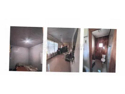 LOTE 001 - Casa de alvenaria localizada na Rua Equador n° 434 em Alegrete/RS, constituída de dois quartos, um banheiro, sala, copa, cozinha, e uma edícula nos fundos do terreno. Terreno esse, designado pelo n°17 da quadra 25, do Bairro Vera Cruz, medindo 10m de frente por 30m de frente a fundos, confrontando: ao Norte, com o lote 18; ao Sul, com a Rua Equador; a Leste, com o lote 15; e, a Oeste, com o lote 19. Matriculado sob n°9.393 do CRI de Alegrete/RS.