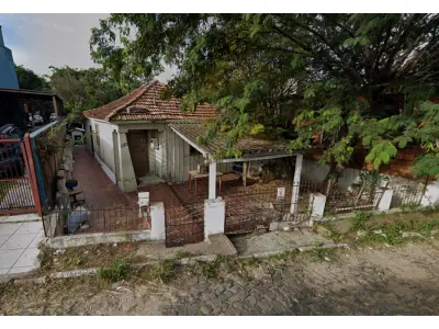 Lote 001 - um terreno com a área de 329,00m² localizado na travessa moreira, n°308 na cidade de santa maria/rs e a respectiva casa de madeira com 65m²