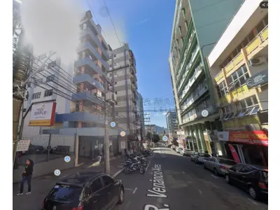 LOTE 001 - Apartamento 201, localizado no 1º andar do Edifício Notre Dame, à rua Venâncio Aires, n°2.008 em Santa Maria/RS, com área privativa de 132,21m², área total de 197,39m² e fração ideal equivalente a 0,04615 no terreno e coisas de uso comum. Matriculado sob n° 92.514 do CRI de Santa Maria/RS. E, o Box 24, localizado no subsolo do Edifício Notre Dame, com área privativa de 12,37m², área total de 15,41m² e fração equivalente a 0,00216 no terreno e coisas de uso comum. Matriculado sob n° 92.511 do CRI de Santa Maria/RS.