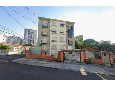 LOTE 001 - Apartamento 401-A, localizado no quinto pavimento ou terceiro andar do ‘’Edifício A Paineira’’, possuindo a área privativa de 85,035m², área real total de 90,135m², localizado na rua General Carneiro sob o nº391 e, pela rua Pinheiro Machado, sob o n°3170, correspondendo-lhe uma fração ideal de 0,0576 no terreno e nas coisas de uso comum. Matriculado sob n°55.560 do CRI de Santa Maria/RS.