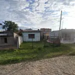 LOTE 001 - Um terreno com a área total de 513,60m², onde encontra-se construído uma casa de  alvenaria, com a área edificada de 47m², situado na Rua Dr. Pio Martins Salgado, nº 68 em Santana do  Livramento/RS, localizado no Setor 09, Quadra 23, Lote 19 do Cadastro Imobiliário da cidade. Matriculado sob nº 24.635 do CRI de Santana do  Livramento/RS.