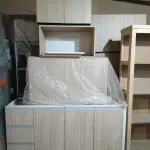 MÓVEIS PLANEJADOS DE COZINHA NOVOS, AOS QUAIS ENCONTRAM-SE DESMONTADOS, 100% (CEM POR CENTO) MDF 18MM, CORPO EM MDF BRANCO E EXTERNO EM AMADEIRADO, MEDIDAS CONFORME PROJETO EM ANEXO E NA FOTO.