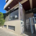 SALA COMERCIAL Nº 01, NO EDIFÍCIO TÍVOLI EM SANTA MARIA/RS, COM UMA ÁREA PRIVATIVA DE 138,040 M² E O BOX GARAGEM Nº 08, LOCALIZADO NO SEGUNDO SUBSOLO OU PRIMEIRO PAVIMENTO DO EDIFÍCIO TÍVOLI, AMBOS SITUADOS  À RUA FLORIANO PEIXOTO, Nº 611 EM SANTA MARIA/RS. MATRICULADOS SOB Nº 85.105 E 85.098 DO CRI DE SANTA MARIA/RS.