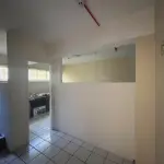 SALA COMERCIAL Nº 01, NO EDIFÍCIO TÍVOLI EM SANTA MARIA/RS, COM UMA ÁREA PRIVATIVA DE 138,040 M² E O BOX GARAGEM Nº 08, LOCALIZADO NO SEGUNDO SUBSOLO OU PRIMEIRO PAVIMENTO DO EDIFÍCIO TÍVOLI, AMBOS SITUADOS  À RUA FLORIANO PEIXOTO, Nº 611 EM SANTA MARIA/RS. MATRICULADOS SOB Nº 85.105 E 85.098 DO CRI DE SANTA MARIA/RS.