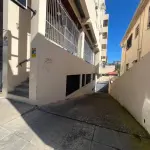 SALA COMERCIAL Nº 01, NO EDIFÍCIO TÍVOLI EM SANTA MARIA/RS, COM UMA ÁREA PRIVATIVA DE 138,040 M² E O BOX GARAGEM Nº 08, LOCALIZADO NO SEGUNDO SUBSOLO OU PRIMEIRO PAVIMENTO DO EDIFÍCIO TÍVOLI, AMBOS SITUADOS  À RUA FLORIANO PEIXOTO, Nº 611 EM SANTA MARIA/RS. MATRICULADOS SOB Nº 85.105 E 85.098 DO CRI DE SANTA MARIA/RS.
