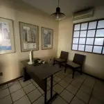 SALA COMERCIAL Nº 01, NO EDIFÍCIO TÍVOLI EM SANTA MARIA/RS, COM UMA ÁREA PRIVATIVA DE 138,040 M² E O BOX GARAGEM Nº 08, LOCALIZADO NO SEGUNDO SUBSOLO OU PRIMEIRO PAVIMENTO DO EDIFÍCIO TÍVOLI, AMBOS SITUADOS  À RUA FLORIANO PEIXOTO, Nº 611 EM SANTA MARIA/RS. MATRICULADOS SOB Nº 85.105 E 85.098 DO CRI DE SANTA MARIA/RS.