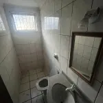 SALA COMERCIAL Nº 01, NO EDIFÍCIO TÍVOLI EM SANTA MARIA/RS, COM UMA ÁREA PRIVATIVA DE 138,040 M² E O BOX GARAGEM Nº 08, LOCALIZADO NO SEGUNDO SUBSOLO OU PRIMEIRO PAVIMENTO DO EDIFÍCIO TÍVOLI, AMBOS SITUADOS  À RUA FLORIANO PEIXOTO, Nº 611 EM SANTA MARIA/RS. MATRICULADOS SOB Nº 85.105 E 85.098 DO CRI DE SANTA MARIA/RS.